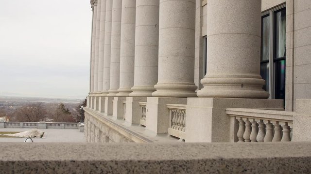 Granite pillars at Utah State Capitol Building dolly shot