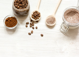 homemade coffee-sugar scrub top view wooden background