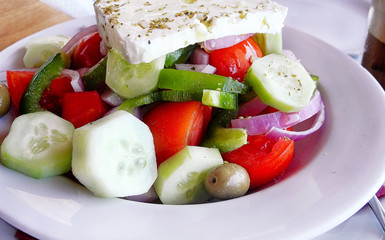 Traditional Greek salad on white plate