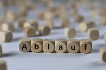 Ablauf - Holzwürfel mit Buchstaben