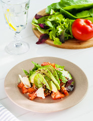 Quinoa salad with vegetables and cheese.