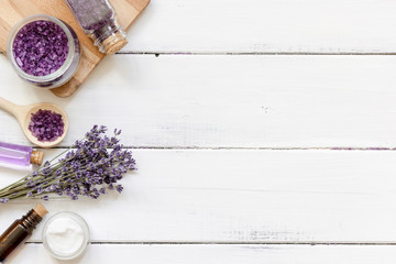 natural creams with lavender flowers on wooden table