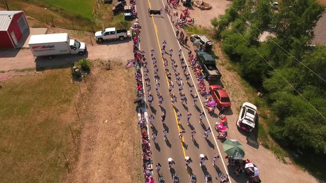 Aerial shot of marching band in july 4th parade