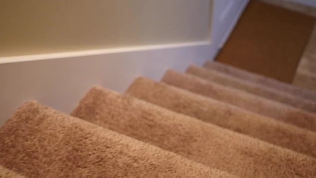 Gimbal low shot traveling down stairs