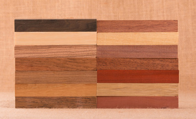 Fototapeta na wymiar Different species of wood in small blocks for woodworking