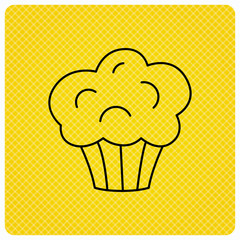 Muffin icon. Cupcake dessert sign. Bakery sweet food symbol. Linear icon on orange background. Vector