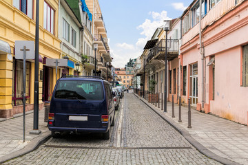 Naklejka na ściany i meble The narrow street of the old town. The old town is full of quiet streets with family hotels