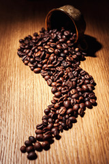 coffee, coffee beans, roasted coffee, roasted coffee beans, coffee beans isolated on Wooden background, coffee beans close up, coffee beans cut out, coffee beans, coffee beans in cup