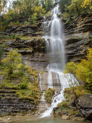 Waterfall in a cliff in autumn