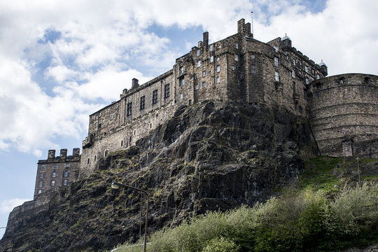 Edinburgh city historic Castle Rock sunny Day backside shot