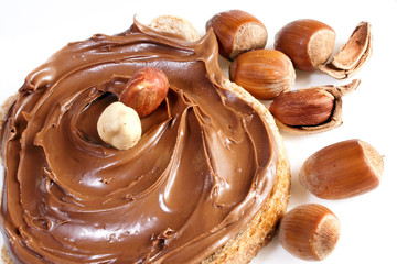 Bread with sweet chocolate hazelnut spread isolated on white background
