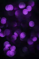 Violet bokeh. Abstract blurred background