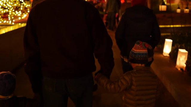 Family at the mormon temple square christmas lights