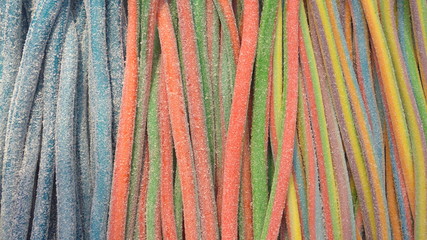 Colorful fruit jelly and licorice snakes