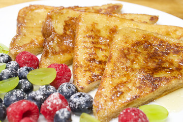 French Toast with berries and honey for breakfast. Healthy breakfast.