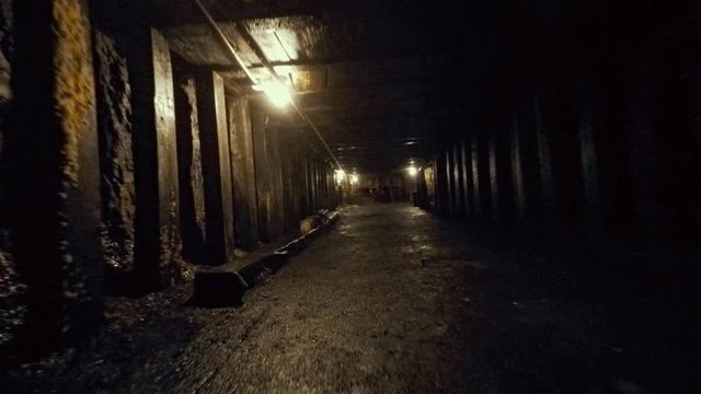 Camera traveling through a coal mine at glace bay