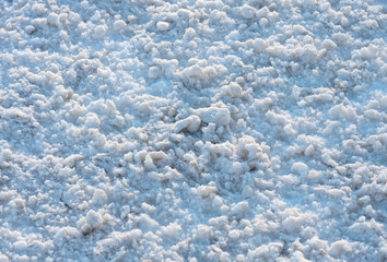Dirty wet snow and ice the frozen slices. Winter