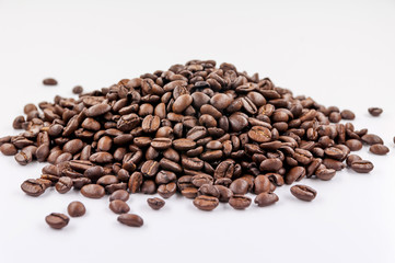 heap of coffee beans isolated on white