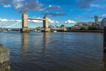 Obraz premium LONDON, ENGLAND - JUNE 15 2016: Sunset panorama of Tower Bridge in London in the late afternoon, England, United Kingdom