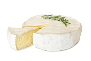 Foto auf Acrylglas Brie cheese with rosemary and cut slice isolated on a white background © Jenifoto
