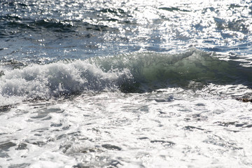 Coastal sea waves on beach