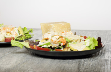 Caesar salad with prawns and avocado