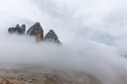 Misty mountain scene in Dolomites mountain Italy