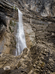Obraz na płótnie Canvas Waterfall in a rugged cliff