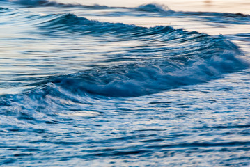 Abstract scene on tropical beach with waves