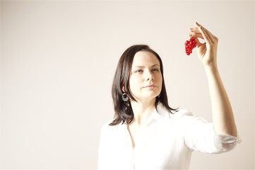 Woman looking at red currant