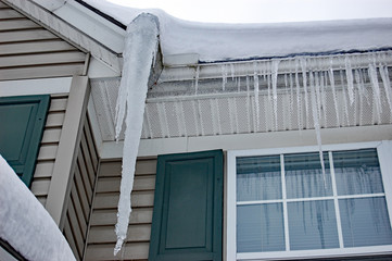 icicles hanging from the roof © mhgstan