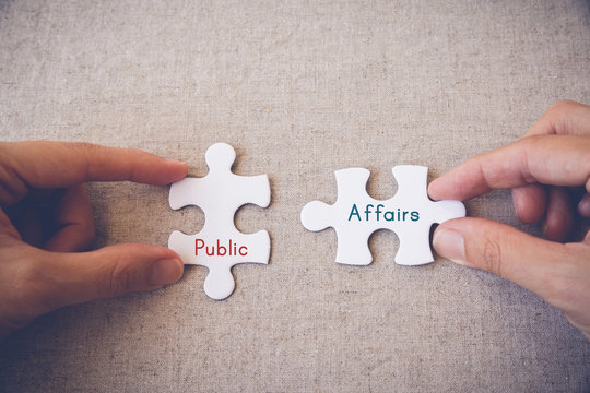 Hands with puzzle pieces and "Public and Affairs" words