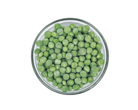 Frozen organic peas in bowl isolated on white background