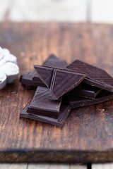 Stack of broken chocolate bar pieces