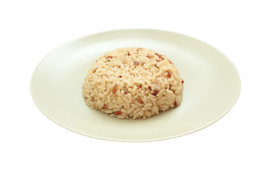 The Cooked Brown Rice On White Background