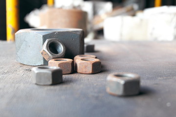 Industrial bolts and nuts with shallow focus.It is available as long as the rust.copy space.
