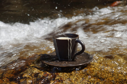 Refreshments and coffee on the rocks at the waterfalls.