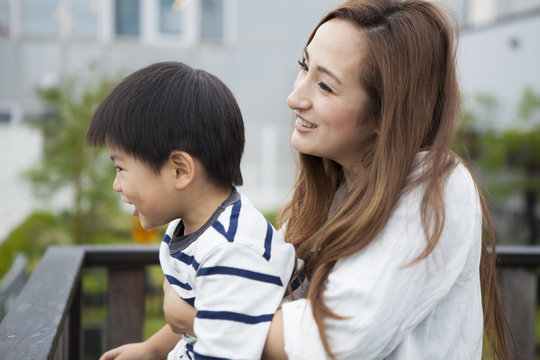 Mom Holds A 3 Year Old Boy