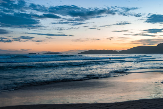 Blue hour in Buzios on the Geriba beach against twilight sky.