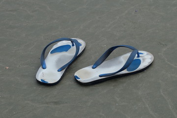 Sandals on sand in the evening,low light