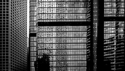 windows of  commercial building in Hong Kong with B&W color