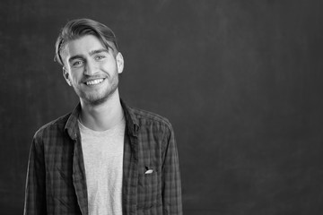 portrait of young startup businessman at modern office, chalkboa