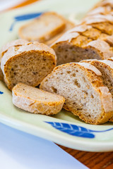 Close-up of Sliced Whole Wheat Baguette on Plate