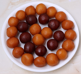 Gulab Jamun, Indian sweets prepared on a festive occasion in Indian homes.