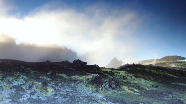 Gas emission at the "Bocca Nuova" of Etna volcano at dawn.