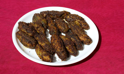 Stuffed spicy bitter gourd or Karela - Indian cooked vegetable