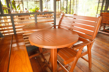 Wooden chairs in coffee shop