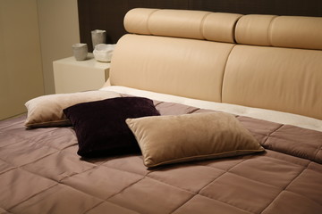 Bed with pillows in the bedroom