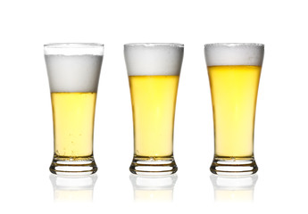 front view frosty lager light beer three level set in clear glas