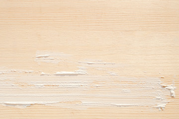 White paint layer on wood wall